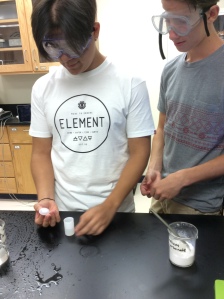 Students prep Fuji film canister.